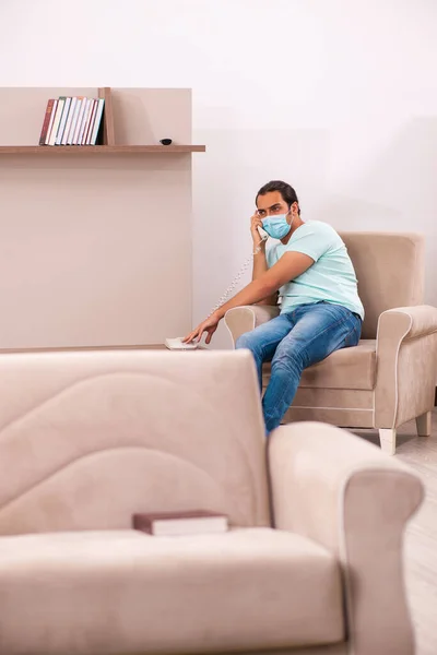 Young man boring at home during pandemic — Stock Photo, Image