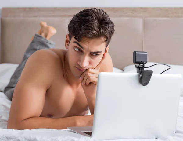 Young sexy man in online dating concept — Stock Photo, Image