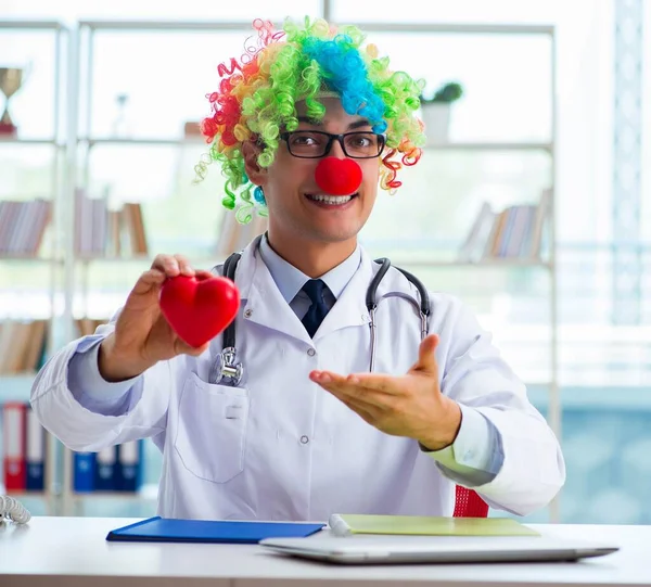 Child cardiologist with stethoscope and red heart — Stock Photo, Image