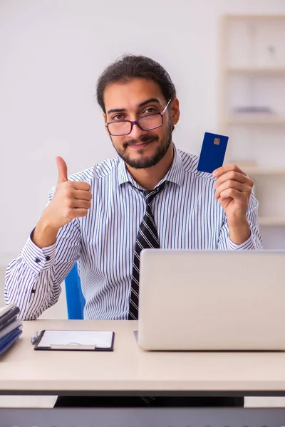 Young male employee in ecommerce concept — Stock Photo, Image