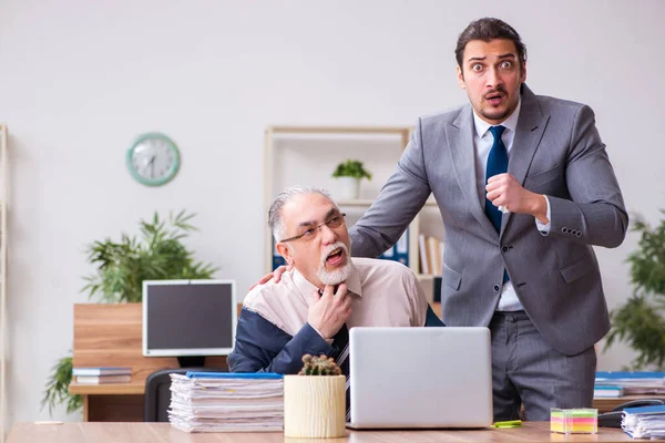 Two employees in pandemic concept at workplace — Stock Photo, Image