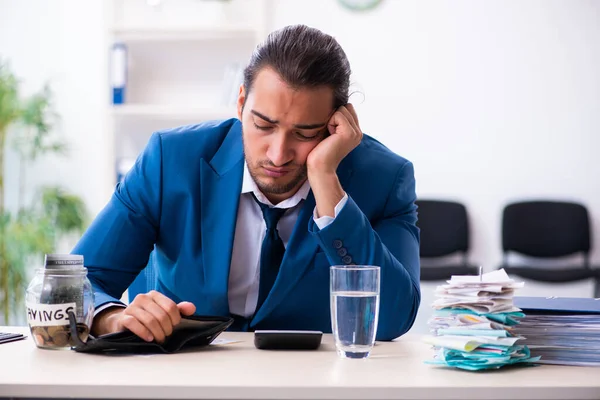 Young male accountant in budget planning concept — Stock Photo, Image