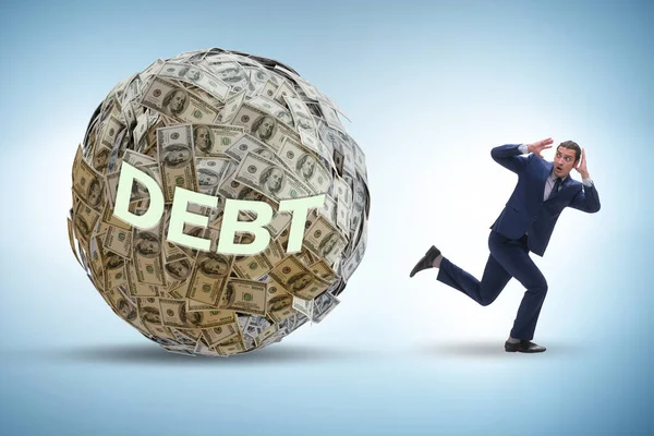 Businessman running away in debt and loan concept — Stock Photo, Image