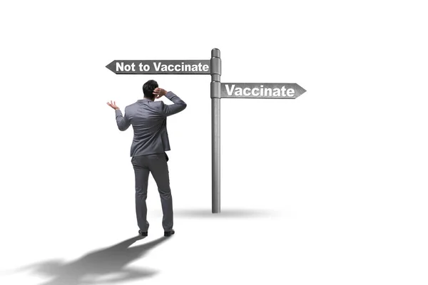 Przedsiębiorca stojący przed dylematem szczepień — Zdjęcie stockowe