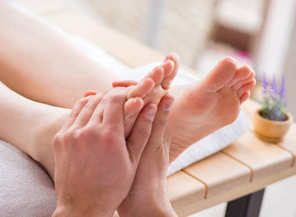 Foot massage in medical spa