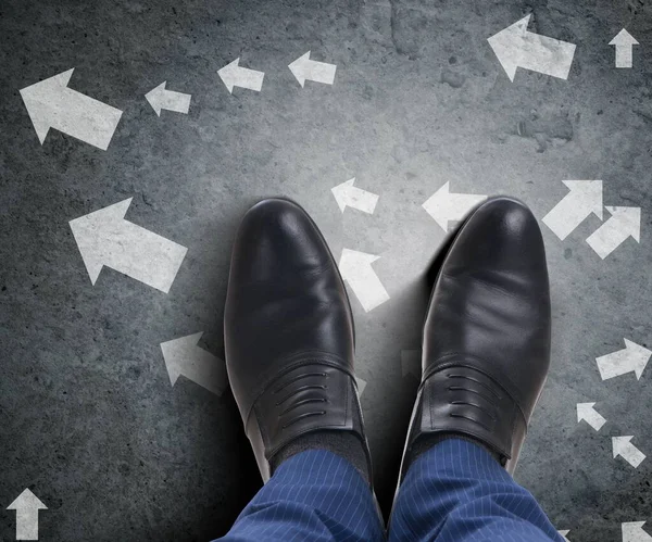 Businessman feet facing difficult choice dilemma — Stock Photo, Image