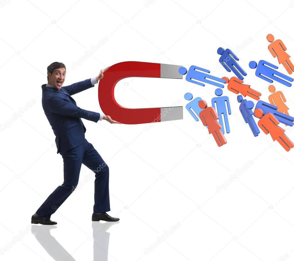 Businessman in recruitment concept with horseshoe magnet