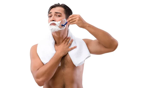 Красивий чоловік голиться ізольовано на білому — стокове фото