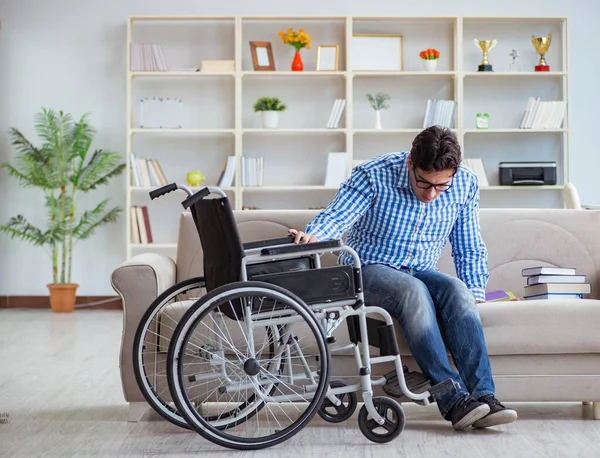 Young student on wheelchair in disability concept