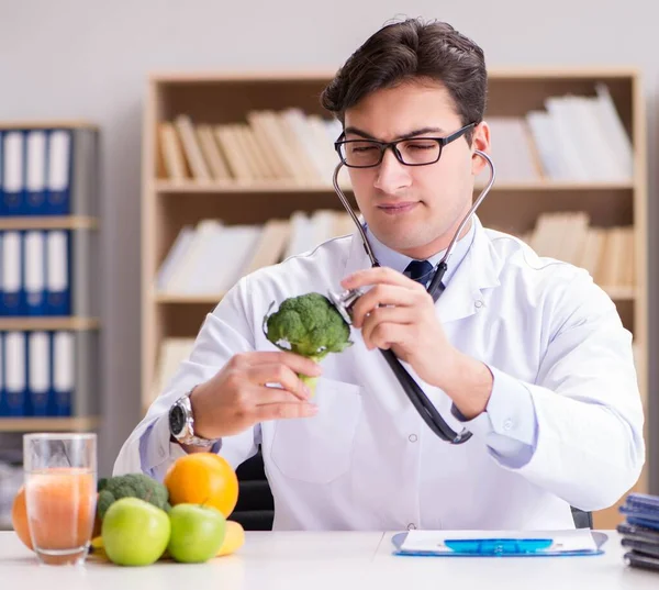 Doctor in GMO food concept — Stock Photo, Image