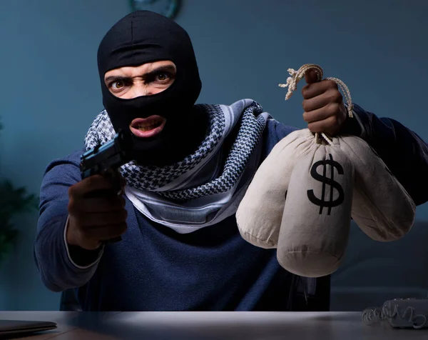 Terrorist burglar with gun asking for money ransom