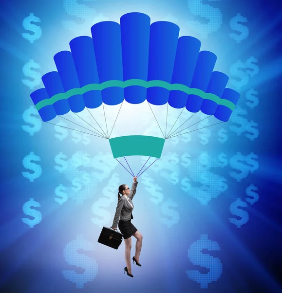 Zakenvrouw in gouden parachute concept — Stockfoto