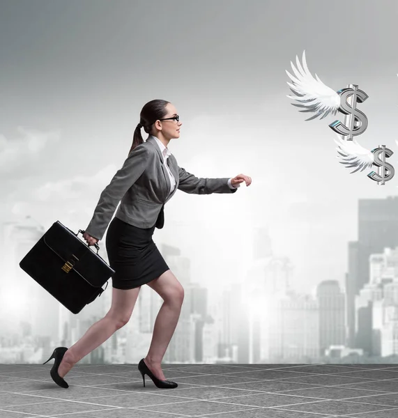 Businesspeople chasing angel investor funding — Stock Photo, Image