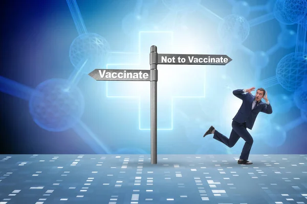Zakenman geconfronteerd met dilemma van vaccinatie — Stockfoto