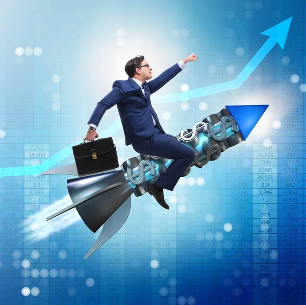 Businessman on rocket in trading concept — Stock Photo, Image