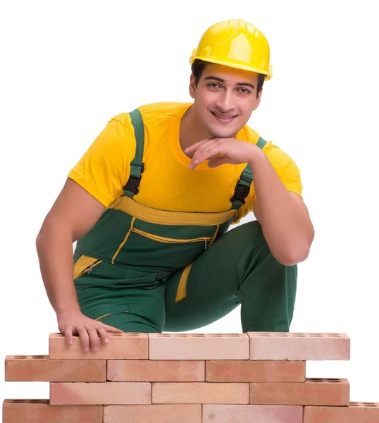 The handsome construction worker building brick wall — Stock Photo, Image