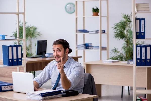 Young male bookkeeper working in the office — Stock Photo, Image