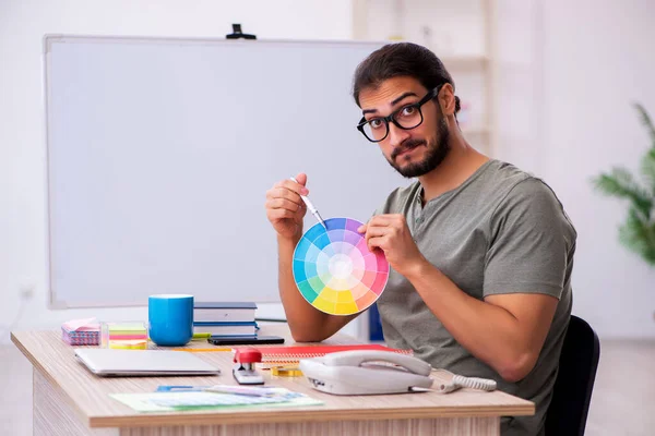 Young male designer working in the office — Stock Photo, Image
