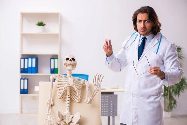 Crazy doctor examining dead patient