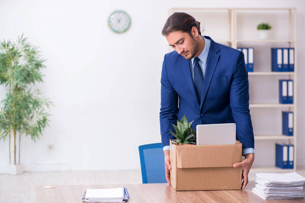 Young man being fired from his work