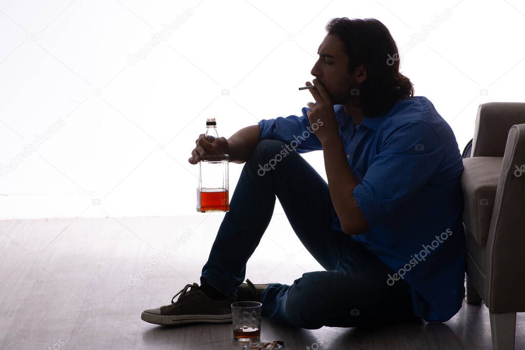 Young man suffering from alcoholism