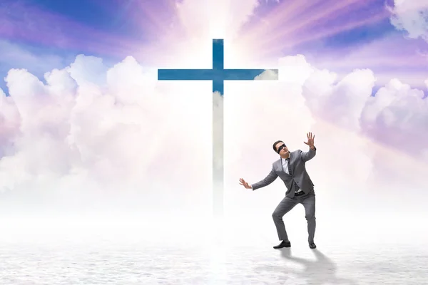 Religious concept with cross and lonely man — Stock Photo, Image