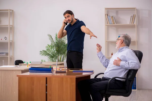 Old male teacher feeling bad during individual lesson