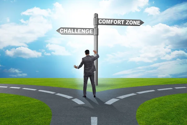 Businessman choosing between leaving comfort zone or not