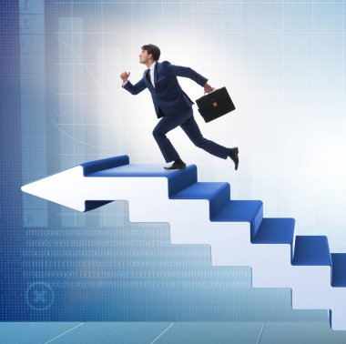 İş adamı iş dünyasında kariyer basamaklarını tırmanıyor