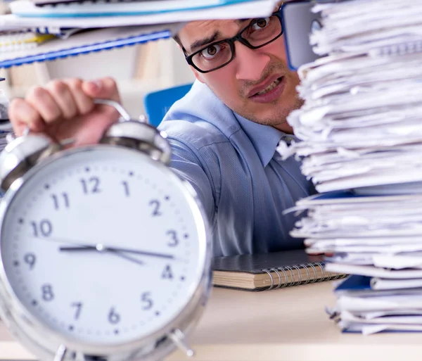 Extremely busy businessman working in office — Stock Photo, Image