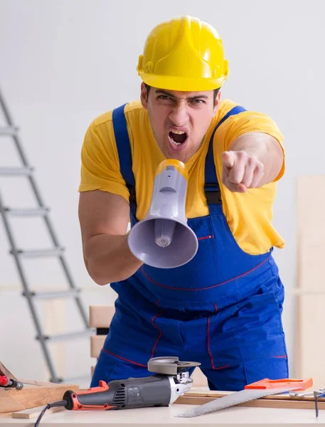 Floor repairman disappointed with his work — Stock Photo, Image