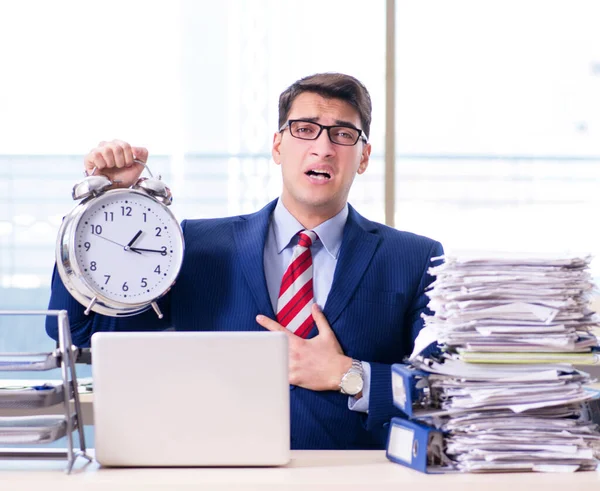Businessman employee in urgency and deadline concept with alarm — Stock Photo, Image