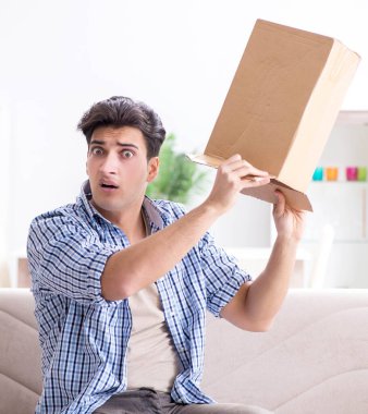 Man receiving empty parcel with stolen goods clipart