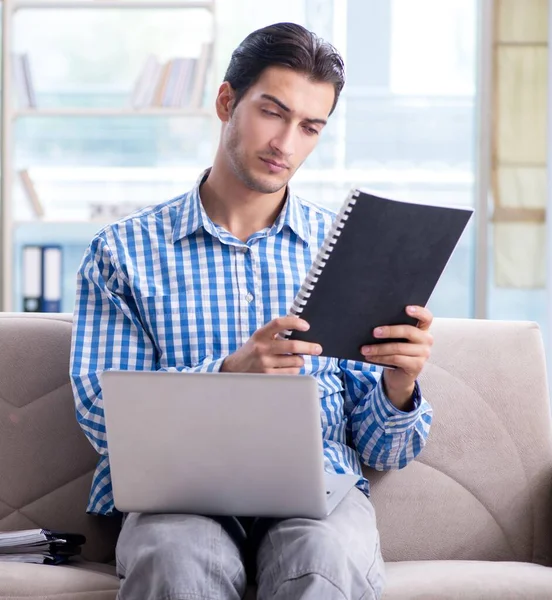 Caucasian student with laptop preparing for university exams — Stock Photo, Image