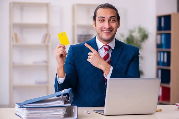 Young businessman employee in e-commerce concept — Stock Photo, Image