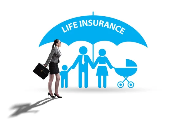 Life insurance concept with family under umbrella — Stock Photo, Image