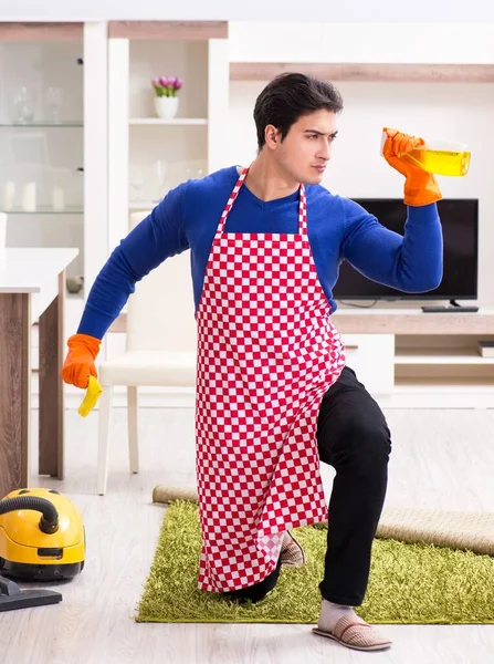 Contractor man cleaning house doing chores — Stock Photo, Image