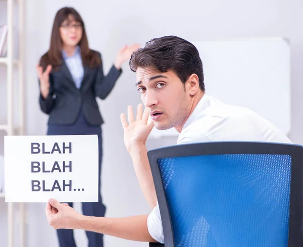 Employee bored at the business presentation — Stock Photo, Image