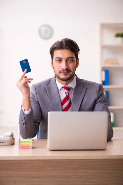 Young businessman employee in ecommerce concept — Stock Photo, Image