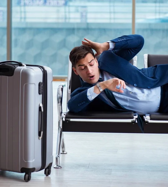 Businessman waiting at the airport for his plane in business cla — Stock Photo, Image