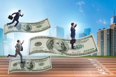 İş adamı 100 dolarlık banknotla uçuyor.