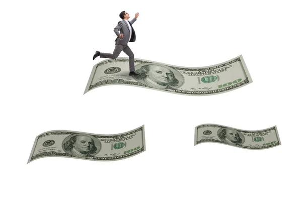 Businessman flying on hundred dollar banknote — Stock Photo, Image