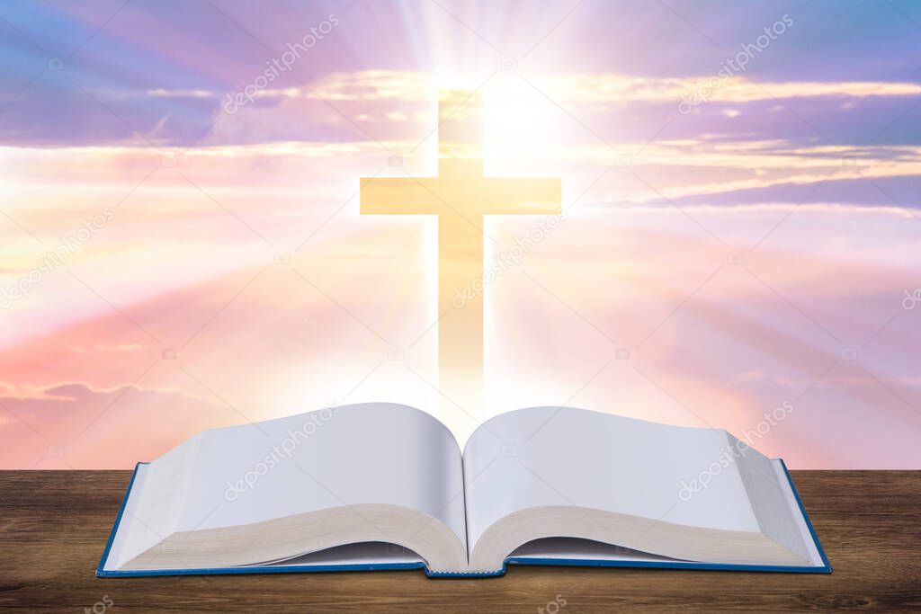 Religious concept with cross and bible book