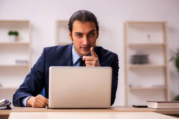 Young male employer sitting in the office — Stock Photo, Image