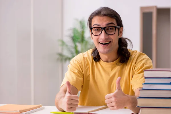 Young male student preparing for exams at home — Stock Photo, Image