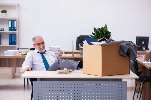 Old male employee being fired from his work — Stock Photo, Image