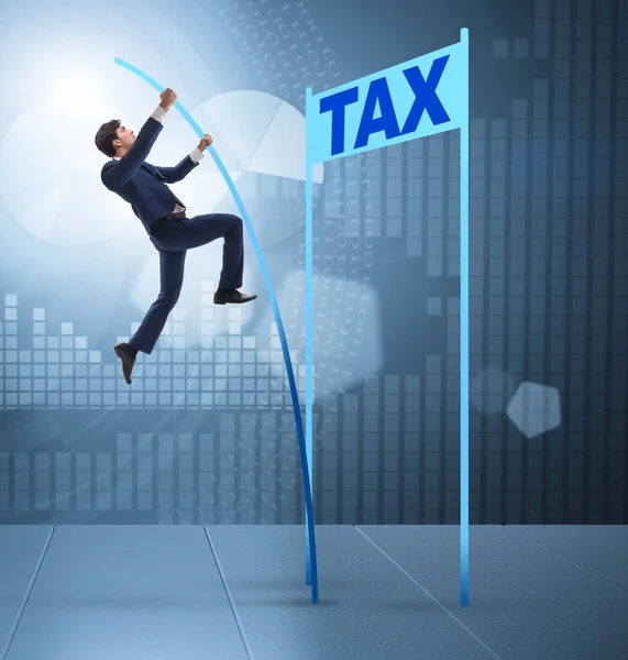 Businessman jumping over tax in tax evasion avoidance concept — Stock Photo, Image