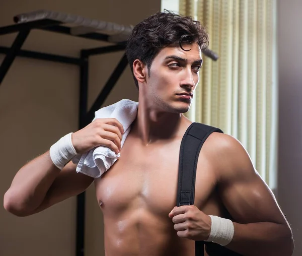 Man tired after workout in sports gym — Stock Photo, Image