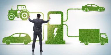 Elektrikli şarj ve araç kavramında iş adamı