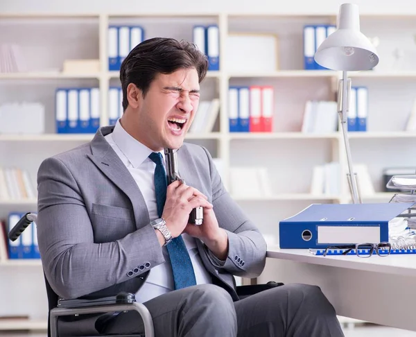 Businessman on wheelchair committing suicide — Stock Photo, Image